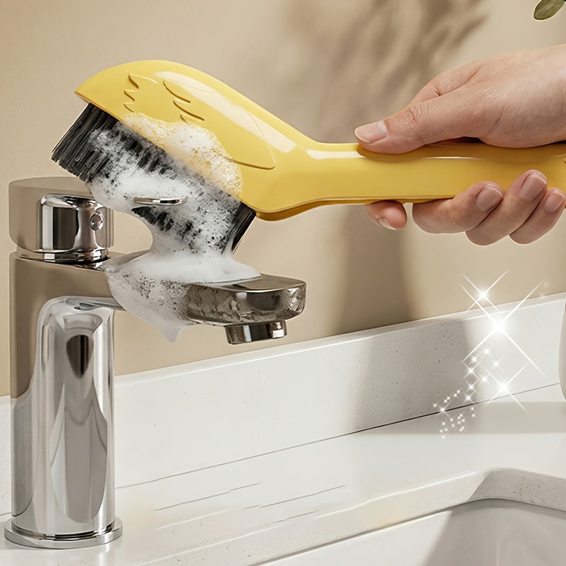 A Multifunctional Gap Cleaning Brush in a Cartoon Swan Design, Featuring a Head on The Handle That Can Be Used As a Spatula to Remove Stubborn Stains. It'S Suitable for Cleaning Stains in The Corners of Kitchens, Bathrooms, And Furniture